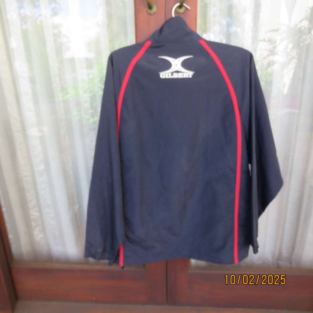 GILBERT navy nylon slip over weather proof long sleeve top. Size XXL. Short front Zip