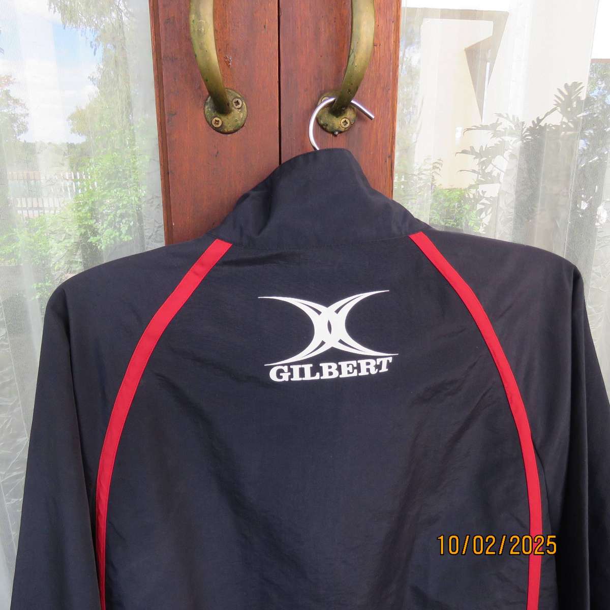 GILBERT navy nylon slip over weather proof long sleeve top. Size XXL. Short front Zip