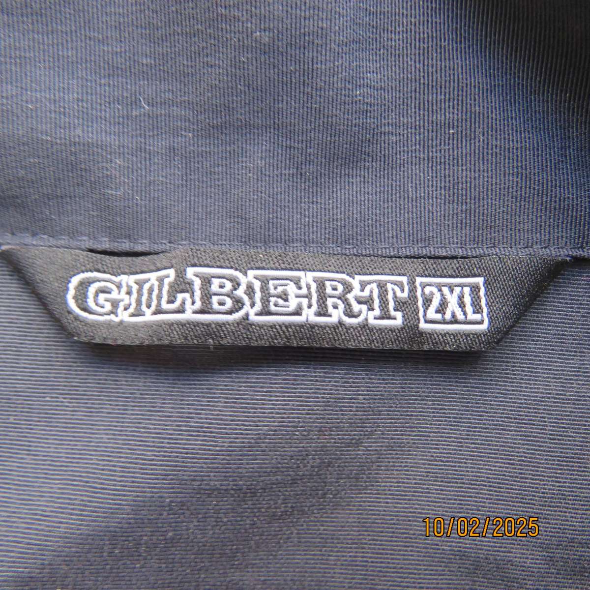 GILBERT navy nylon slip over weather proof long sleeve top. Size XXL. Short front Zip