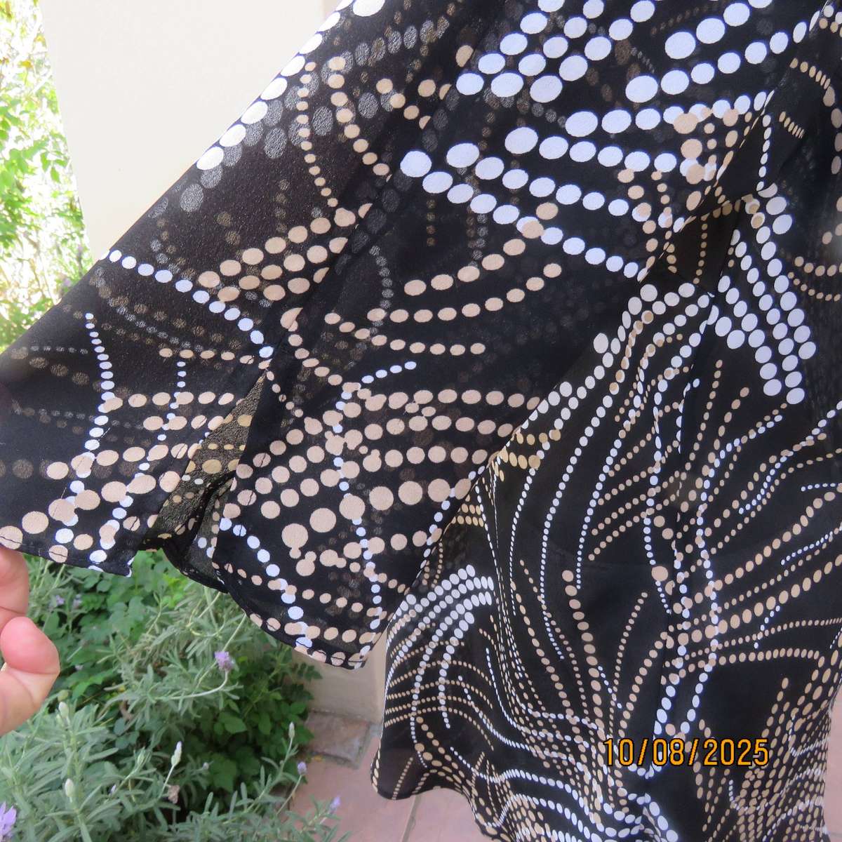 DONATELLA black sheer polyester cream-white dot printed V neck top. Size 40