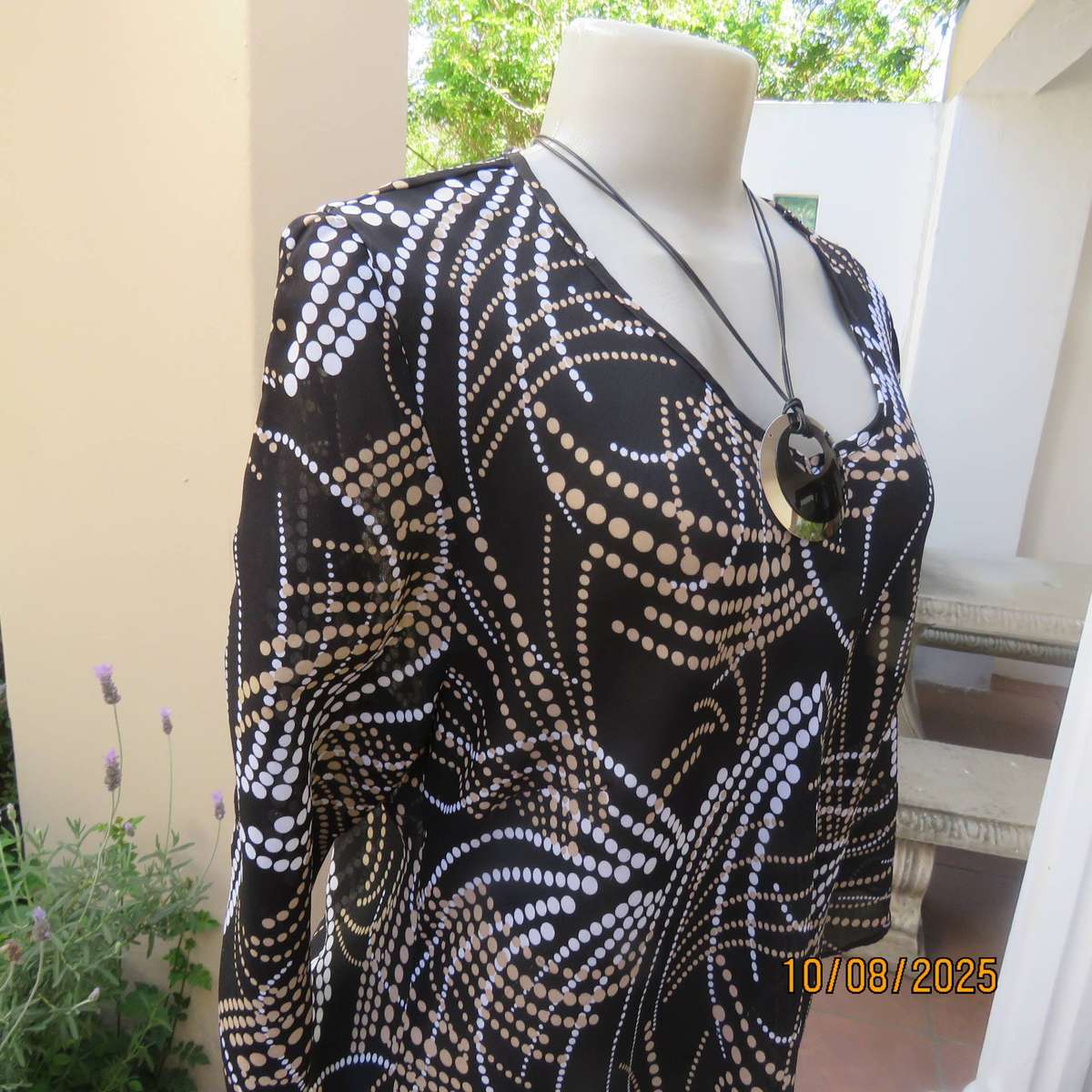 DONATELLA black sheer polyester cream-white dot printed V neck top. Size 40