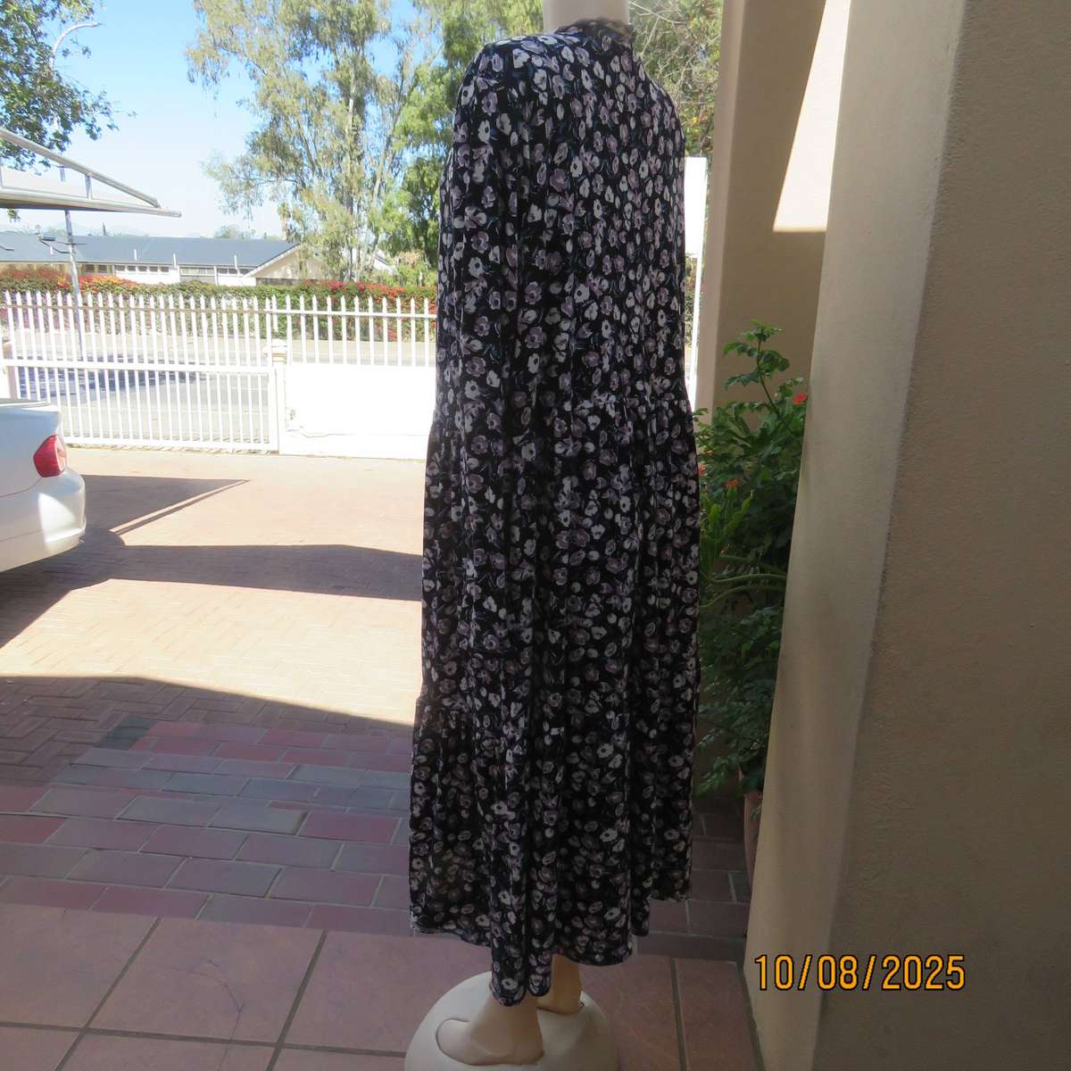 Black stretch polyester tiered slip over dress with lilac-white-blue flowers. Size 44