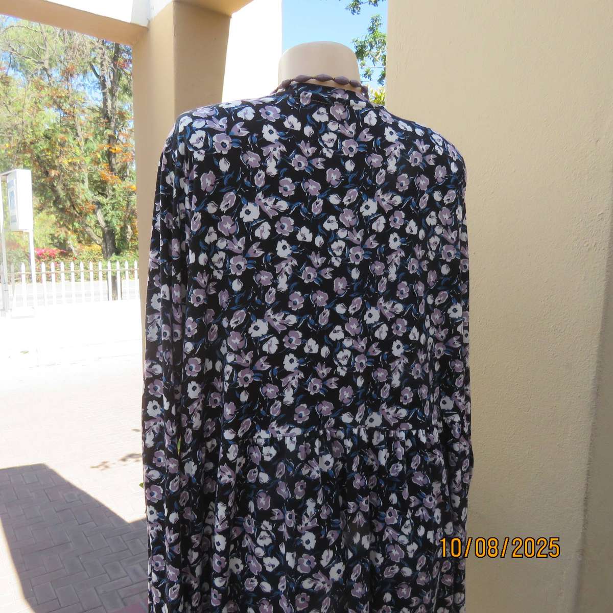 Black stretch polyester tiered slip over dress with lilac-white-blue flowers. Size 44