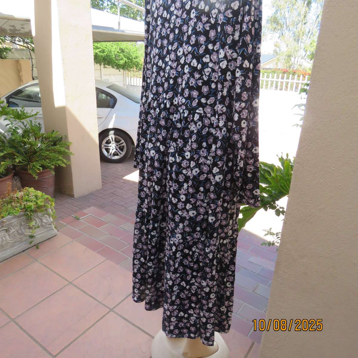 Black stretch polyester tiered slip over dress with lilac-white-blue flowers. Size 44