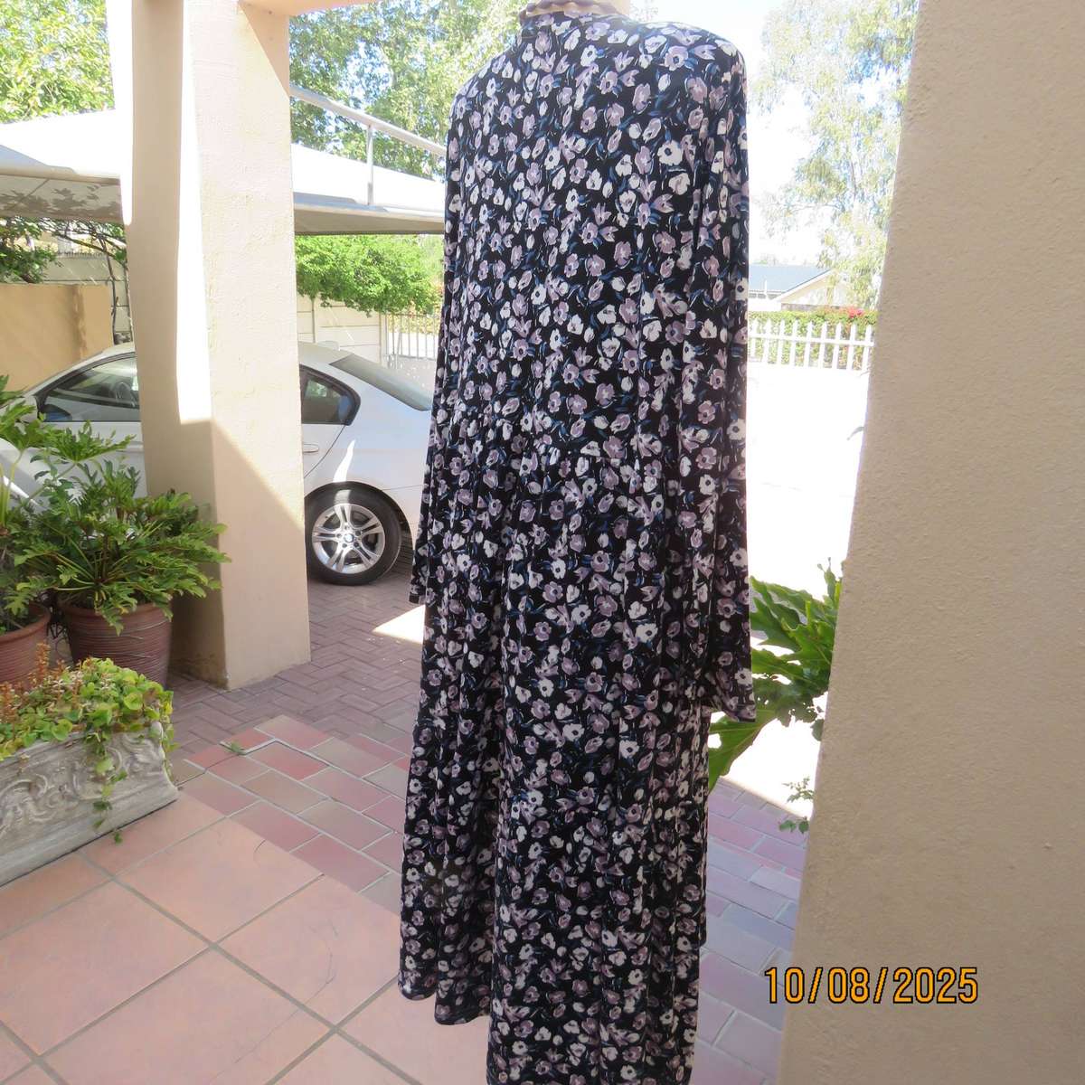 Black stretch polyester tiered slip over dress with lilac-white-blue flowers. Size 44