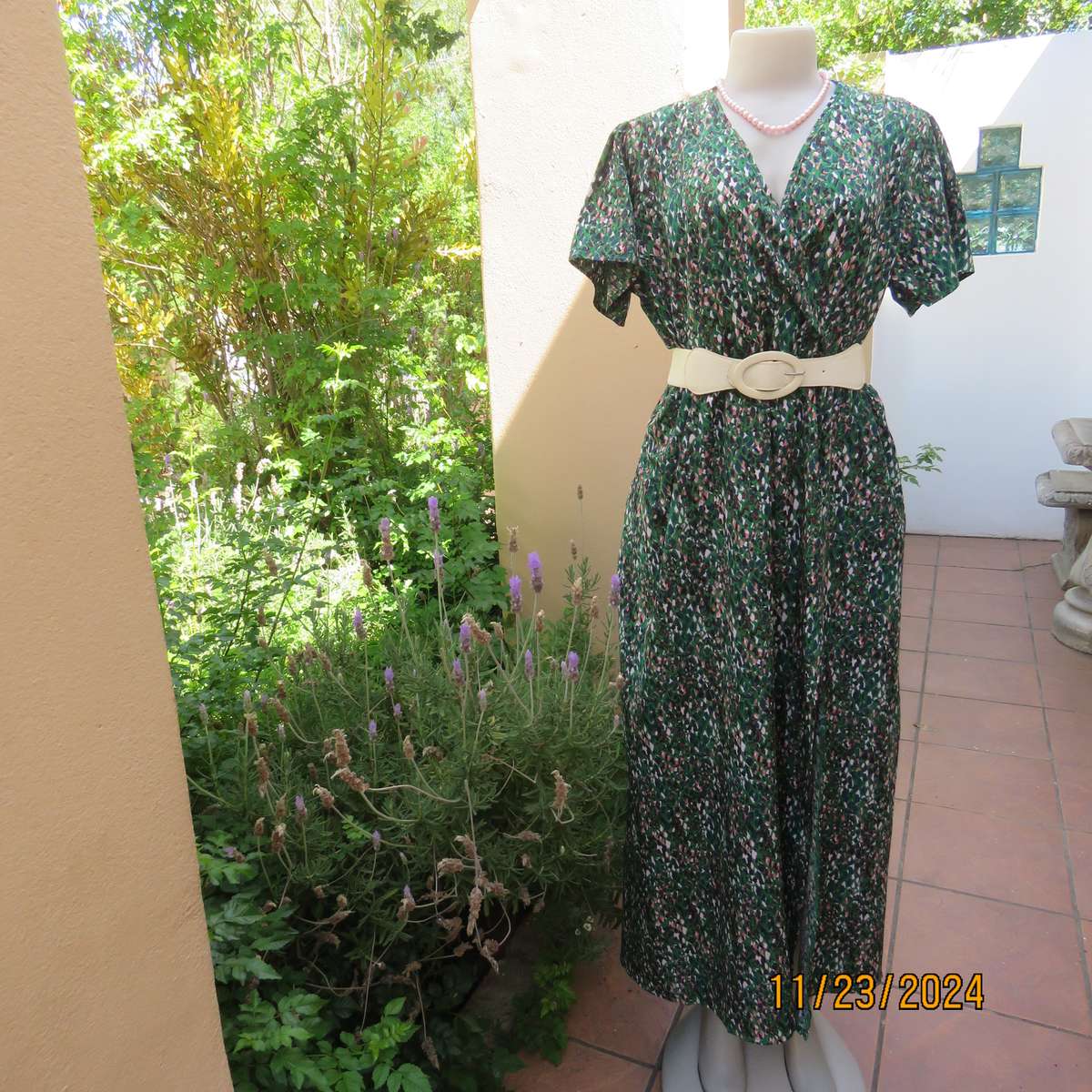 Maxi boutique made colourful dress with cross over bustline and elasticated waist. Size 40. As new