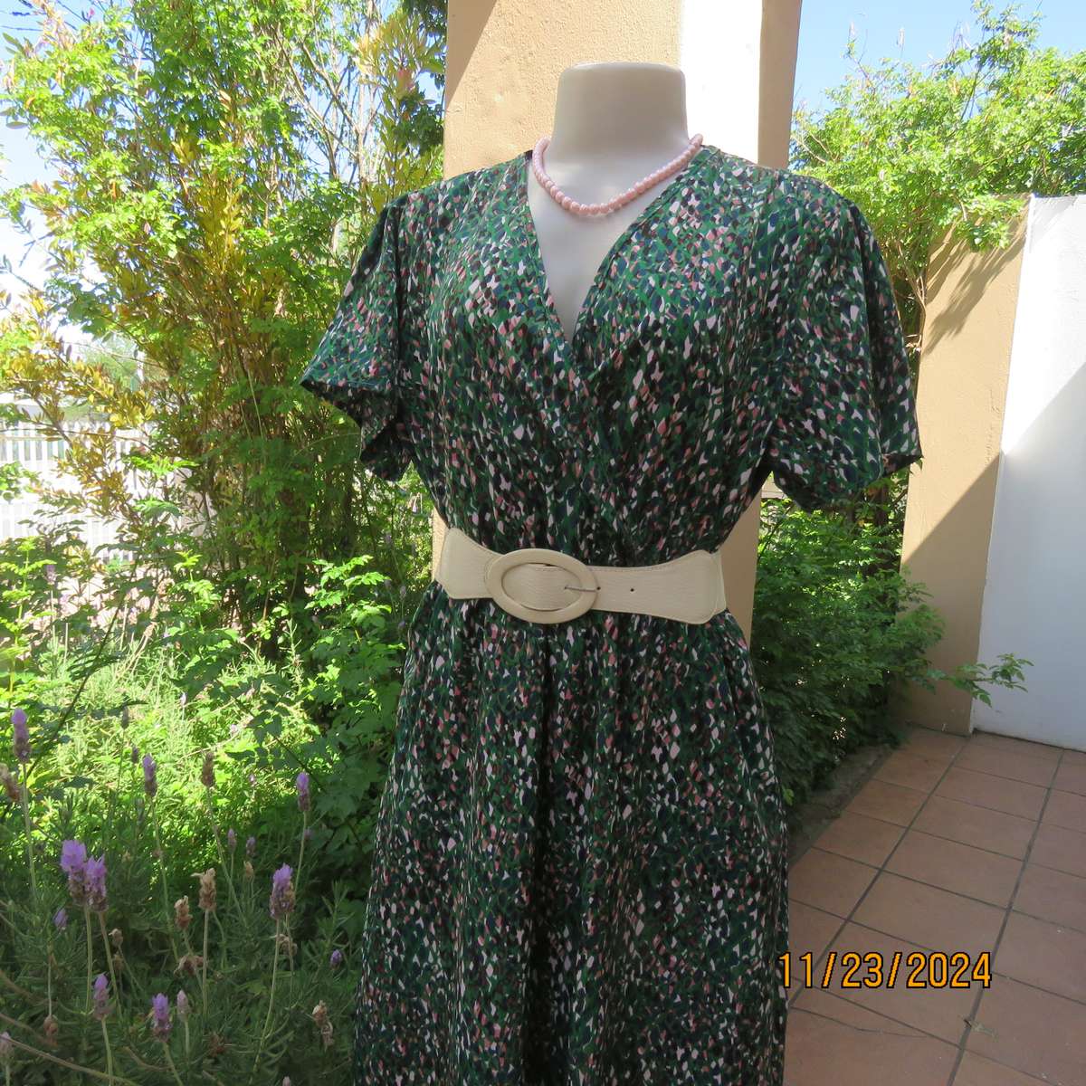 Maxi boutique made colourful dress with cross over bustline and elasticated waist. Size 40. As new