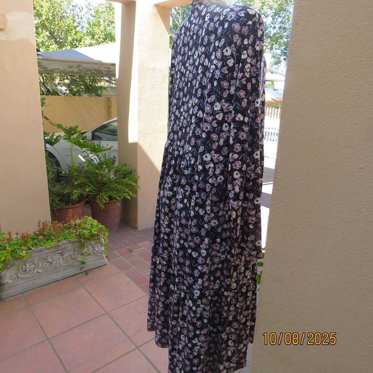 Black stretch polyester tiered slip over dress with lilac-white-blue flowers. Size 44