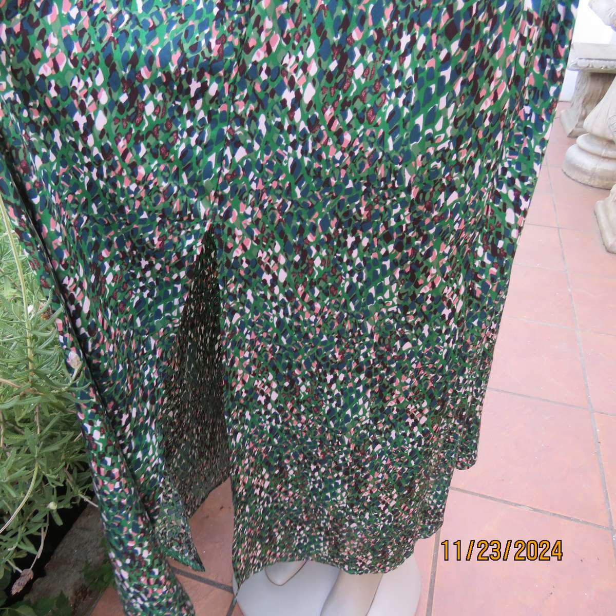 Maxi boutique made colourful dress with cross over bustline and elasticated waist. Size 40. As new
