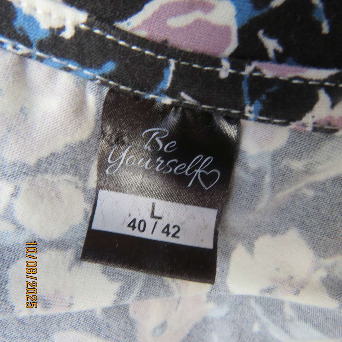 Black stretch polyester tiered slip over dress with lilac-white-blue flowers. Size 44