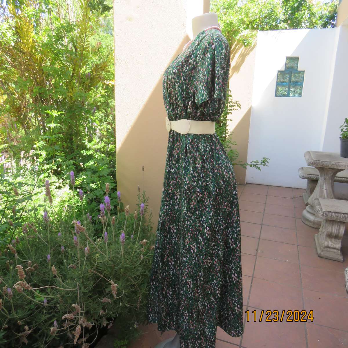 Maxi boutique made colourful dress with cross over bustline and elasticated waist. Size 40. As new