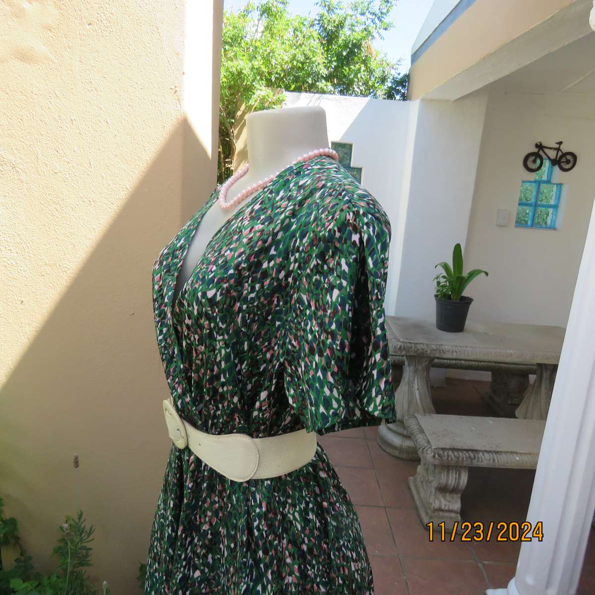 Maxi boutique made colourful dress with cross over bustline and elasticated waist. Size 40. As new