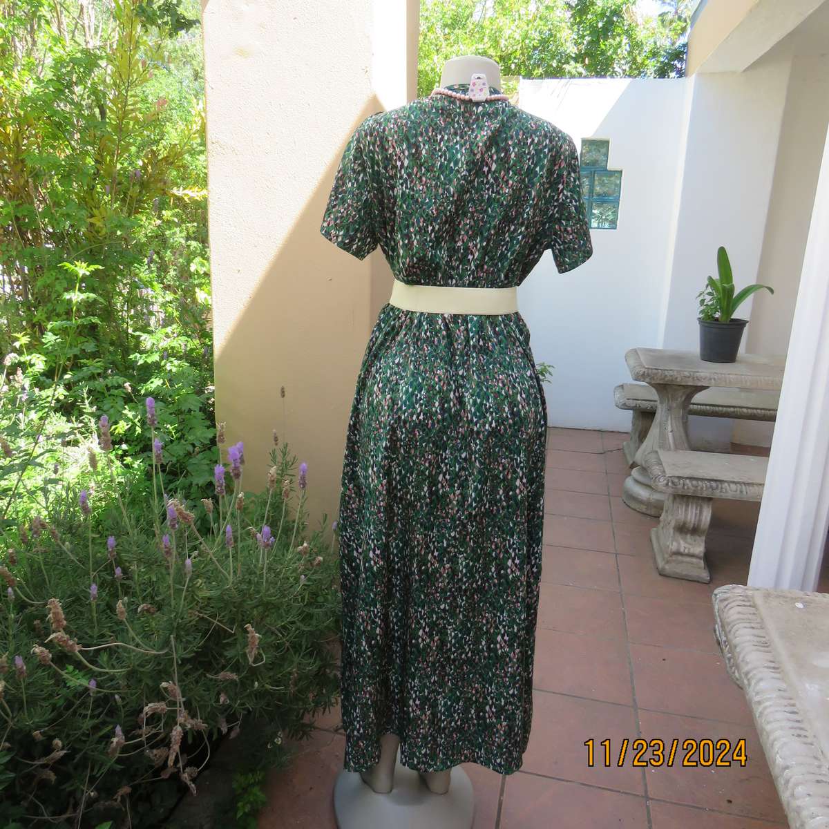 Maxi boutique made colourful dress with cross over bustline and elasticated waist. Size 40. As new