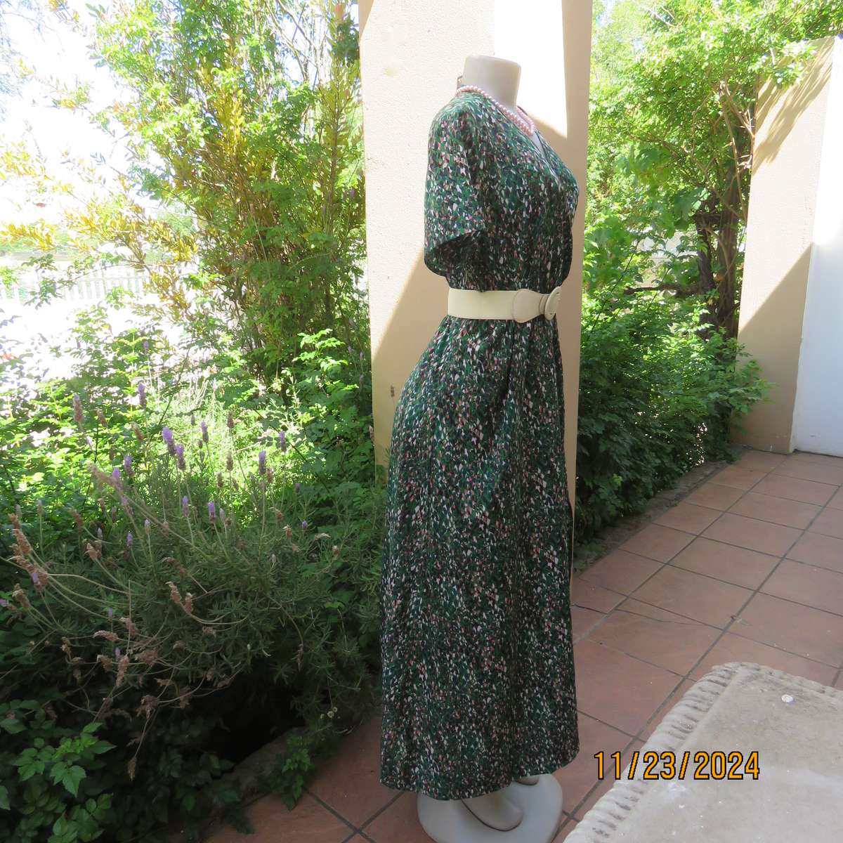 Maxi boutique made colourful dress with cross over bustline and elasticated waist. Size 40. As new