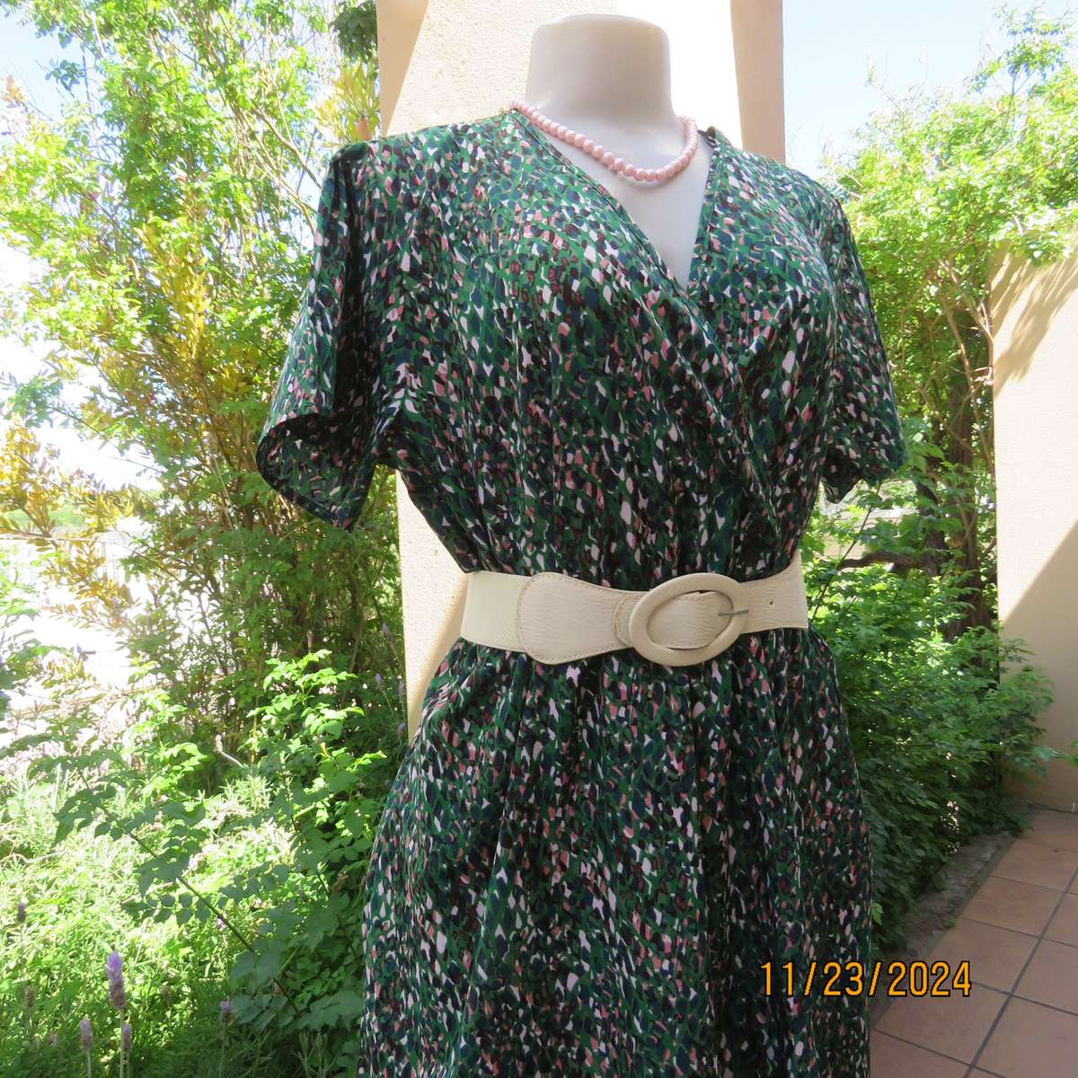 Maxi boutique made colourful dress with cross over bustline and elasticated waist. Size 40. As new