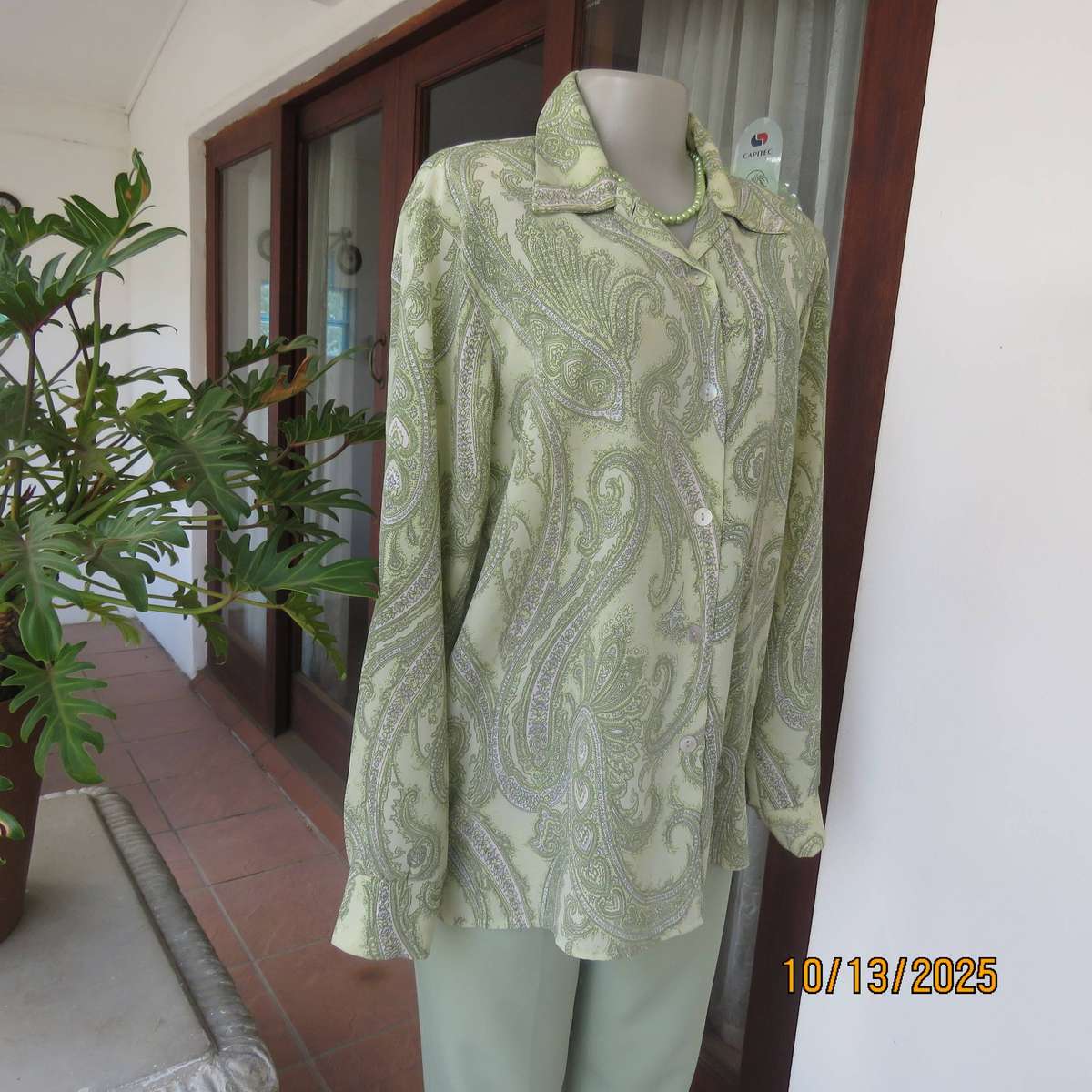 CONTRADICT mint green polyester long sleeve top with darker paisley print in size 40