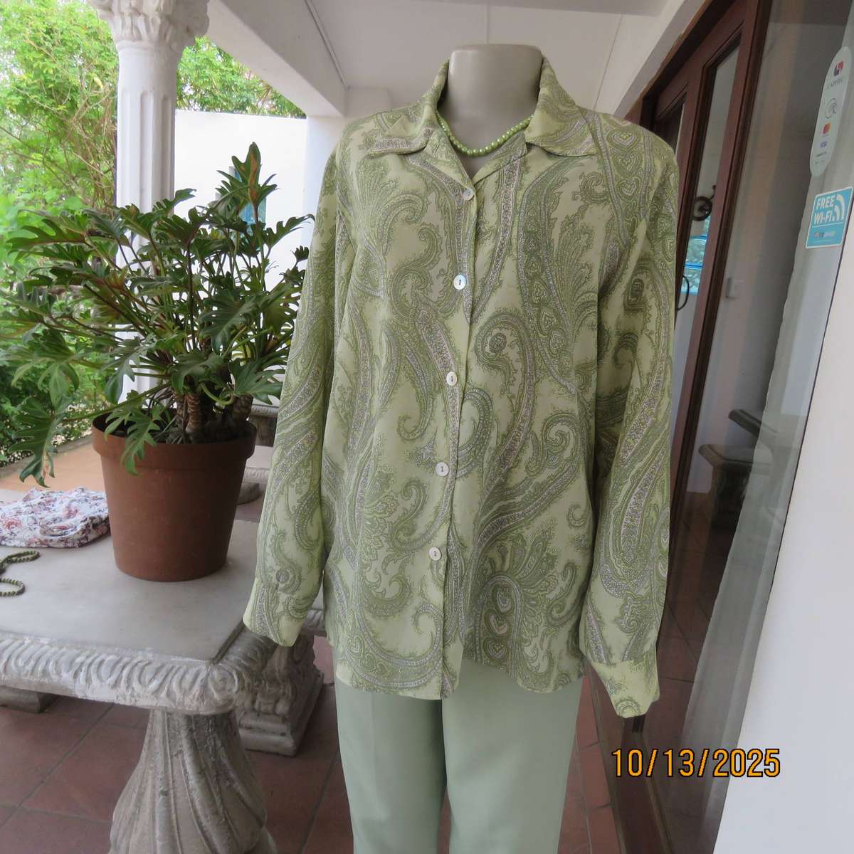 CONTRADICT mint green polyester long sleeve top with darker paisley print in size 40