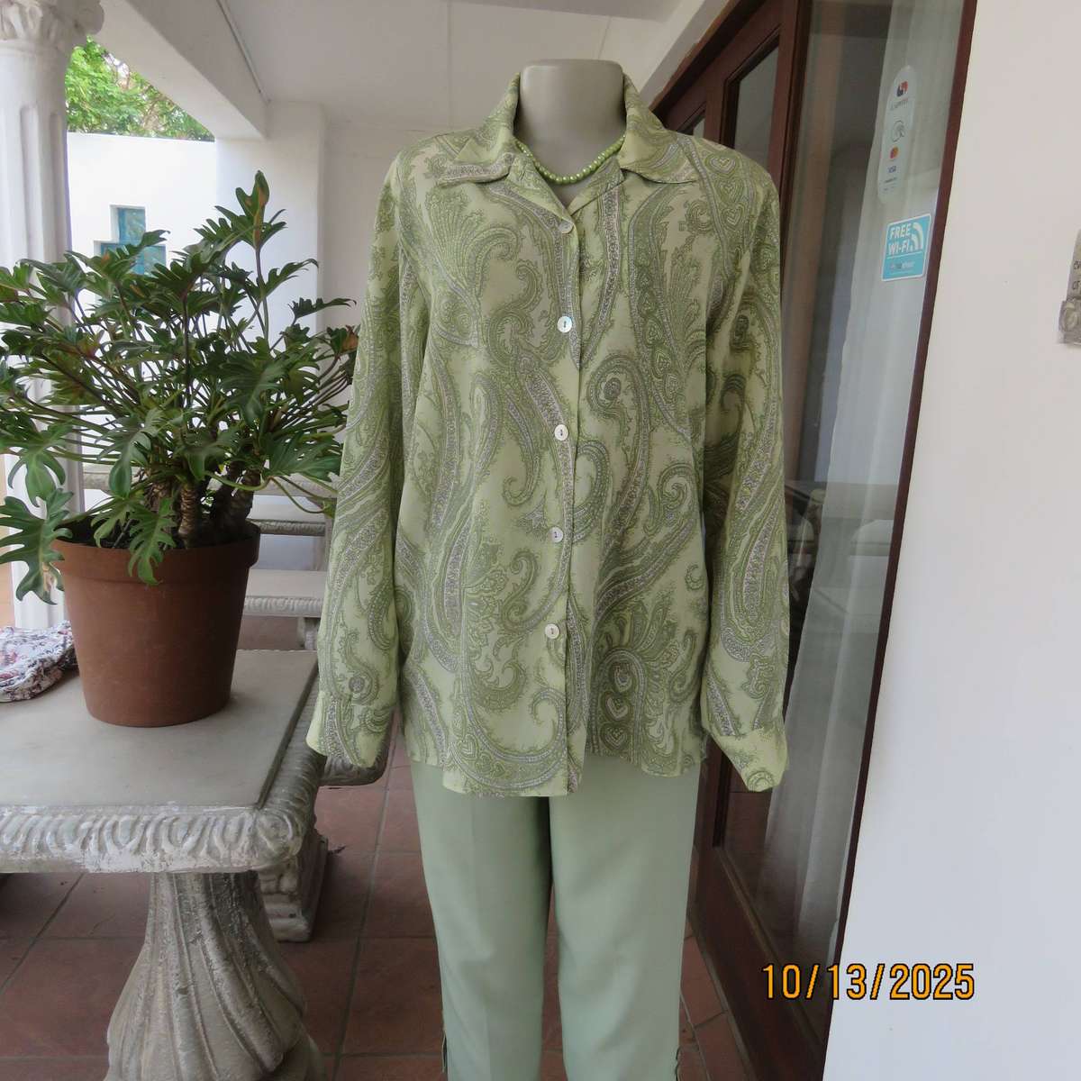 CONTRADICT mint green polyester long sleeve top with darker paisley print in size 40