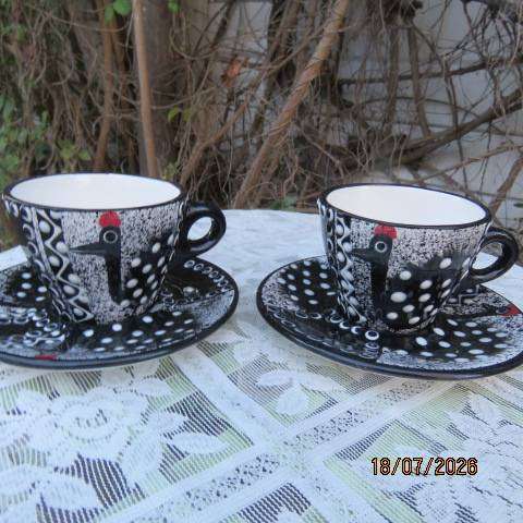 SIFISILE Pottery black hand-painted ceramic teacups and saucers with guinea fowls