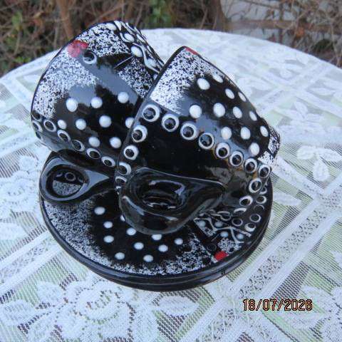SIFISILE Pottery black hand-painted ceramic teacups and saucers with guinea fowls