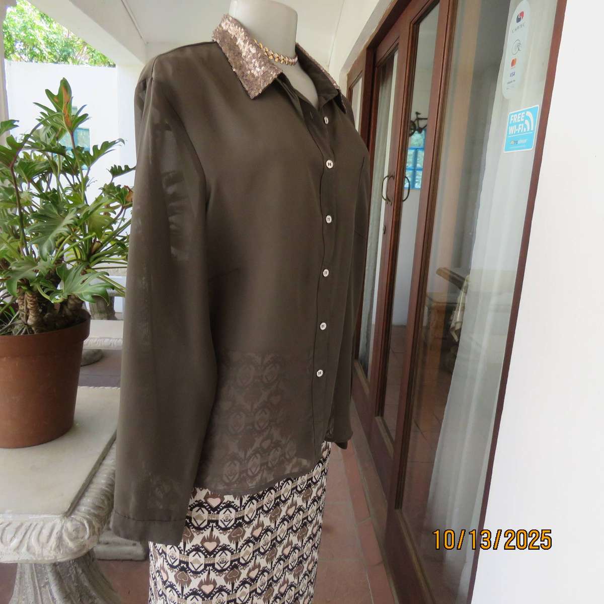 Chocolate brown sheer button down top with sequined collar. Size 40.