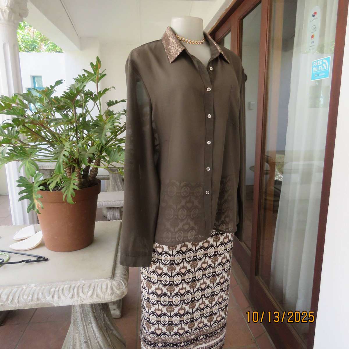 Chocolate brown sheer button down top with sequined collar. Size 40.