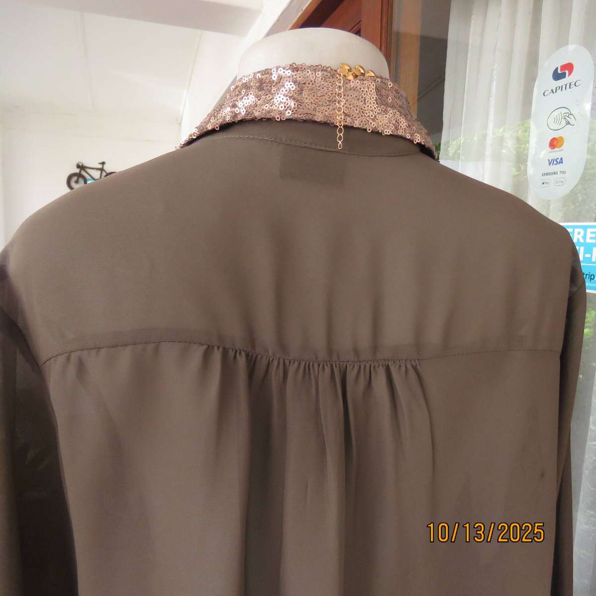 Chocolate brown sheer button down top with sequined collar. Size 40.