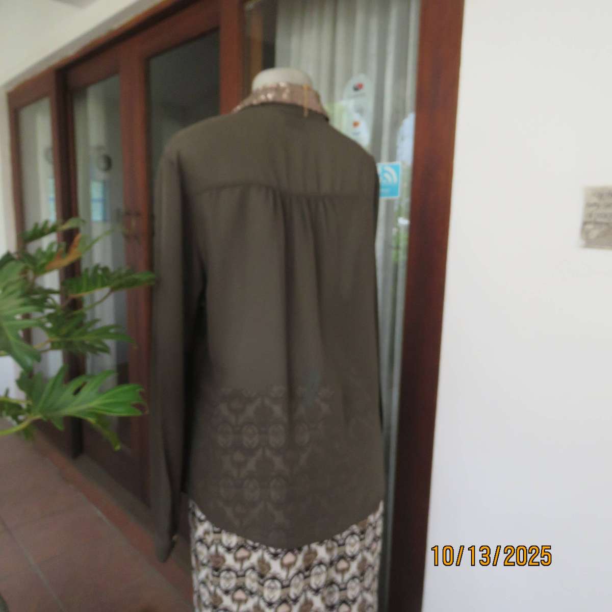 Chocolate brown sheer button down top with sequined collar. Size 40.