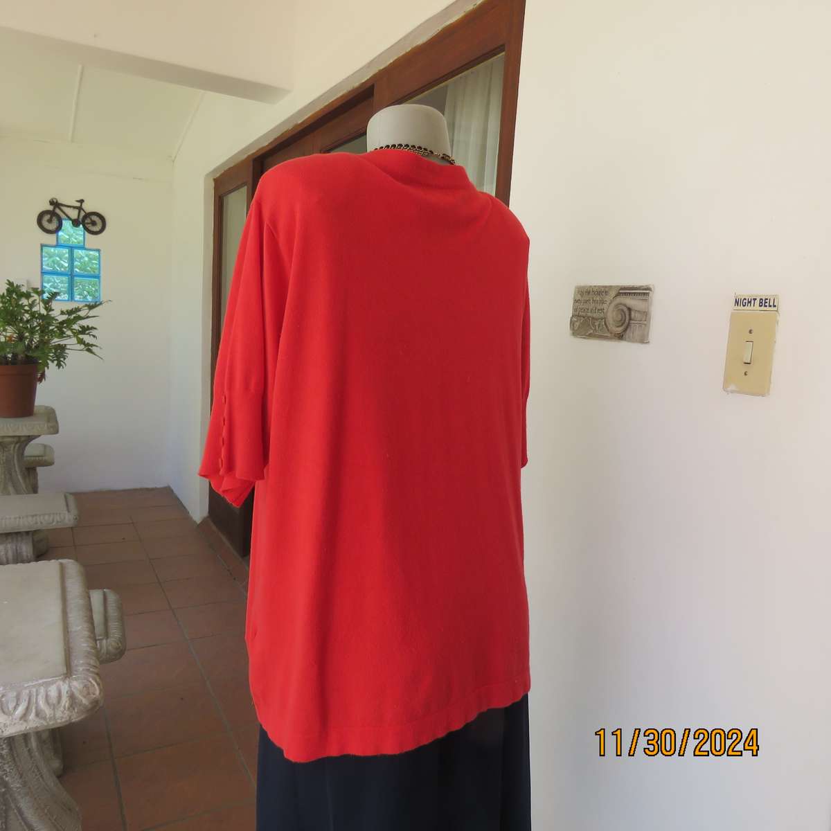 Statement red short sleeve knitted cardi in viscose stretch. Size 44-46.By RENE TAYLOR.As new