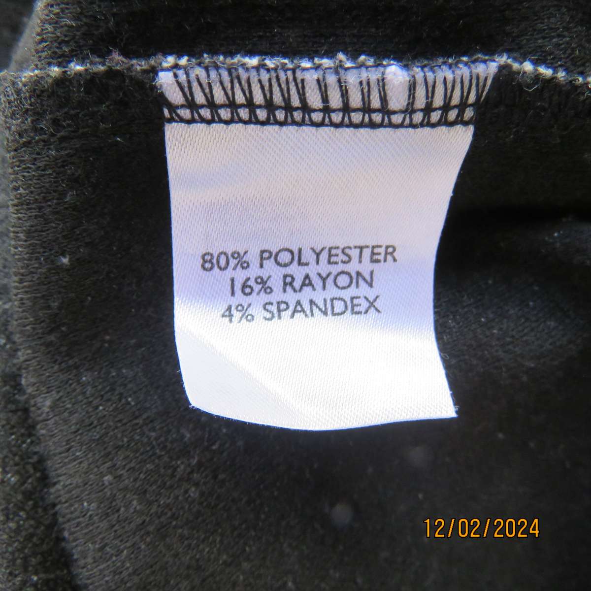 RENE TAYLOR soft polyester-rayon stretch loose hanging capped sleeve black-white top. Size 44.As new