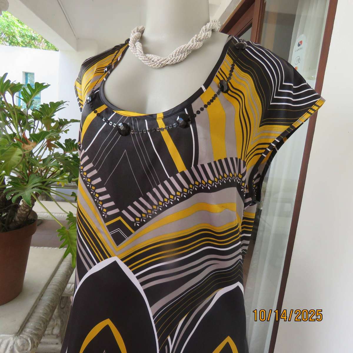 Silky shiny long polyester top in black-grey-gold geometric print. Embellished. Size 40
