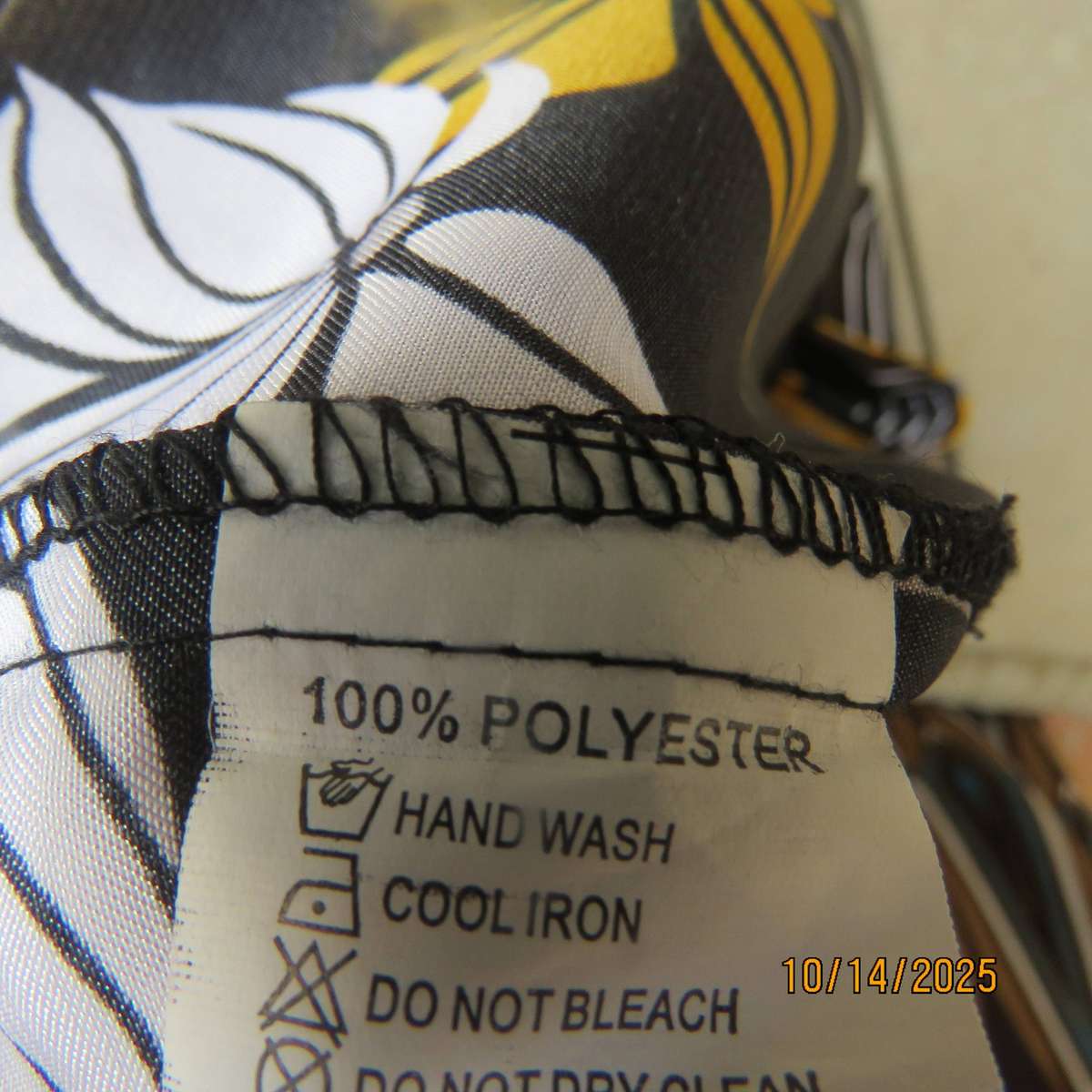 Silky shiny long polyester top in black-grey-gold geometric print. Embellished. Size 40