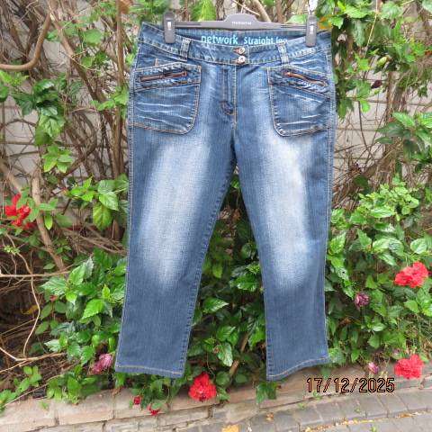 Straight legged blue denim polycotton stretch low rise jeans size 40. As new.