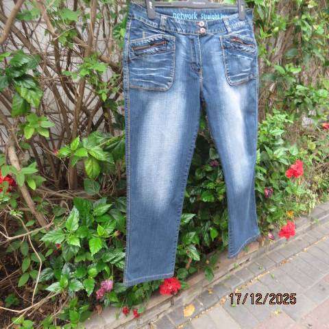 Straight legged blue denim polycotton stretch low rise jeans size 40. As new.