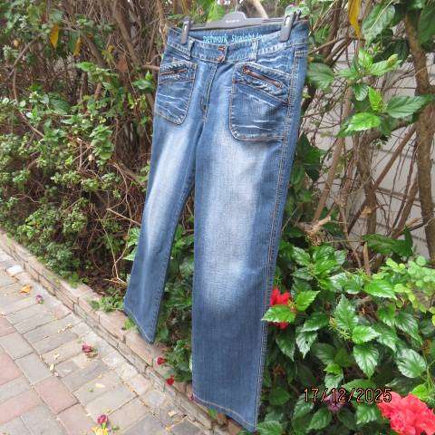 Straight legged blue denim polycotton stretch low rise jeans size 40. As new.