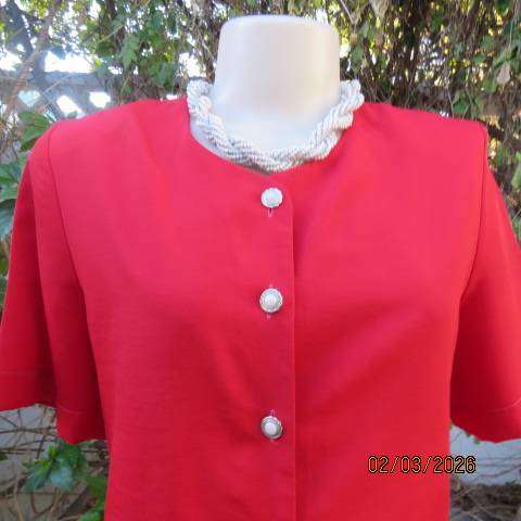 WOOLWORTHS bright red button down short sleeve top with front lace hem. Size 34