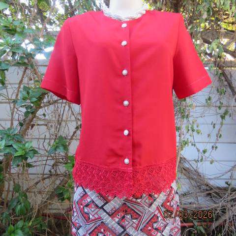WOOLWORTHS bright red button down short sleeve top with front lace hem. Size 34