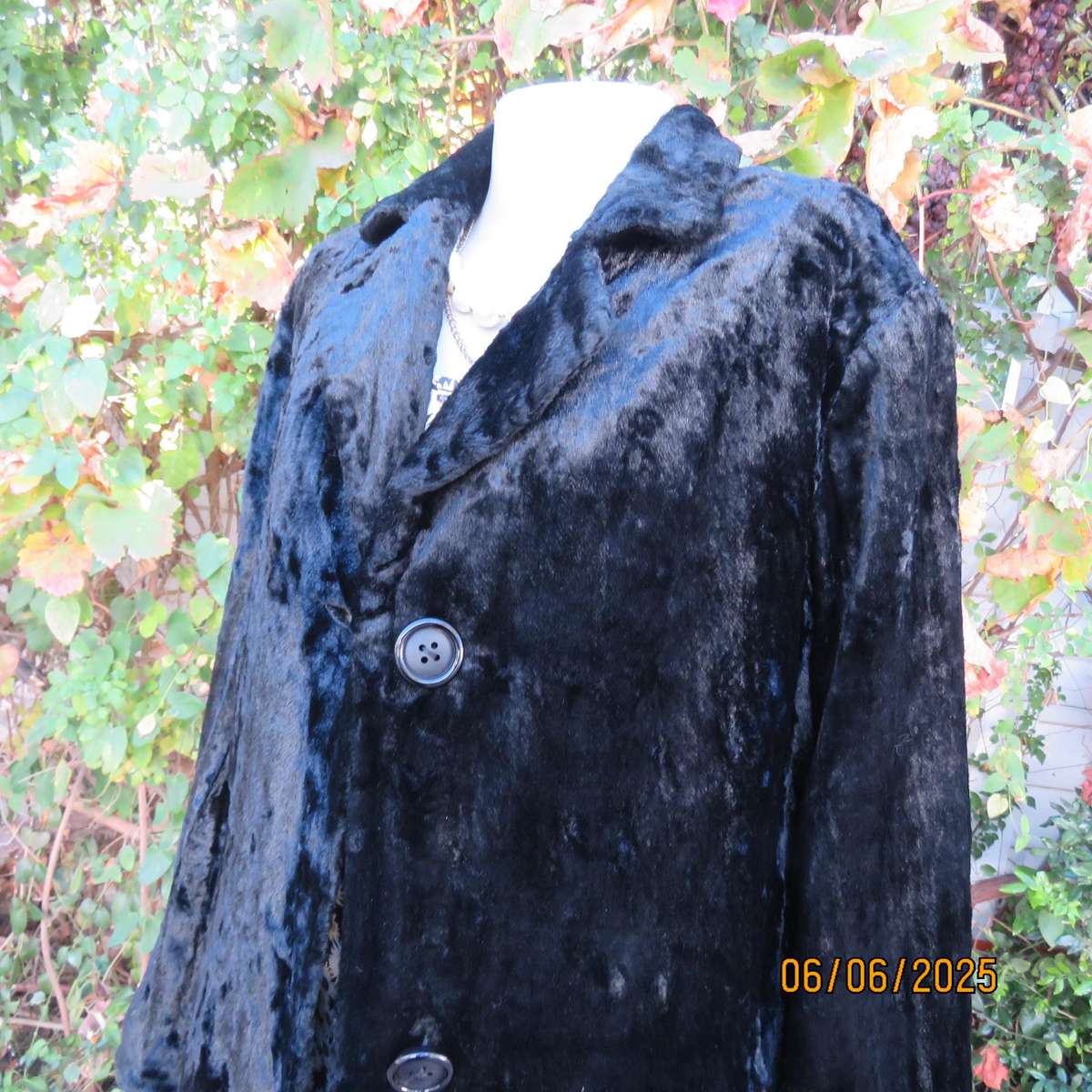 DOLORES black faux fur vintage long sleeve lined coat size 38. Side pockets.