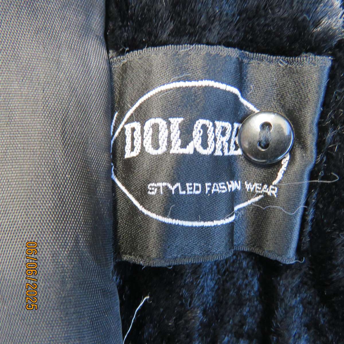 DOLORES black faux fur vintage long sleeve lined coat size 38. Side pockets.