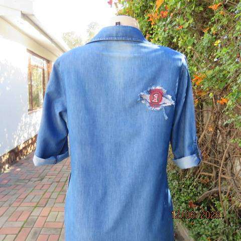 Blue denim shift dress with banded V neckline and side pockets, size 36