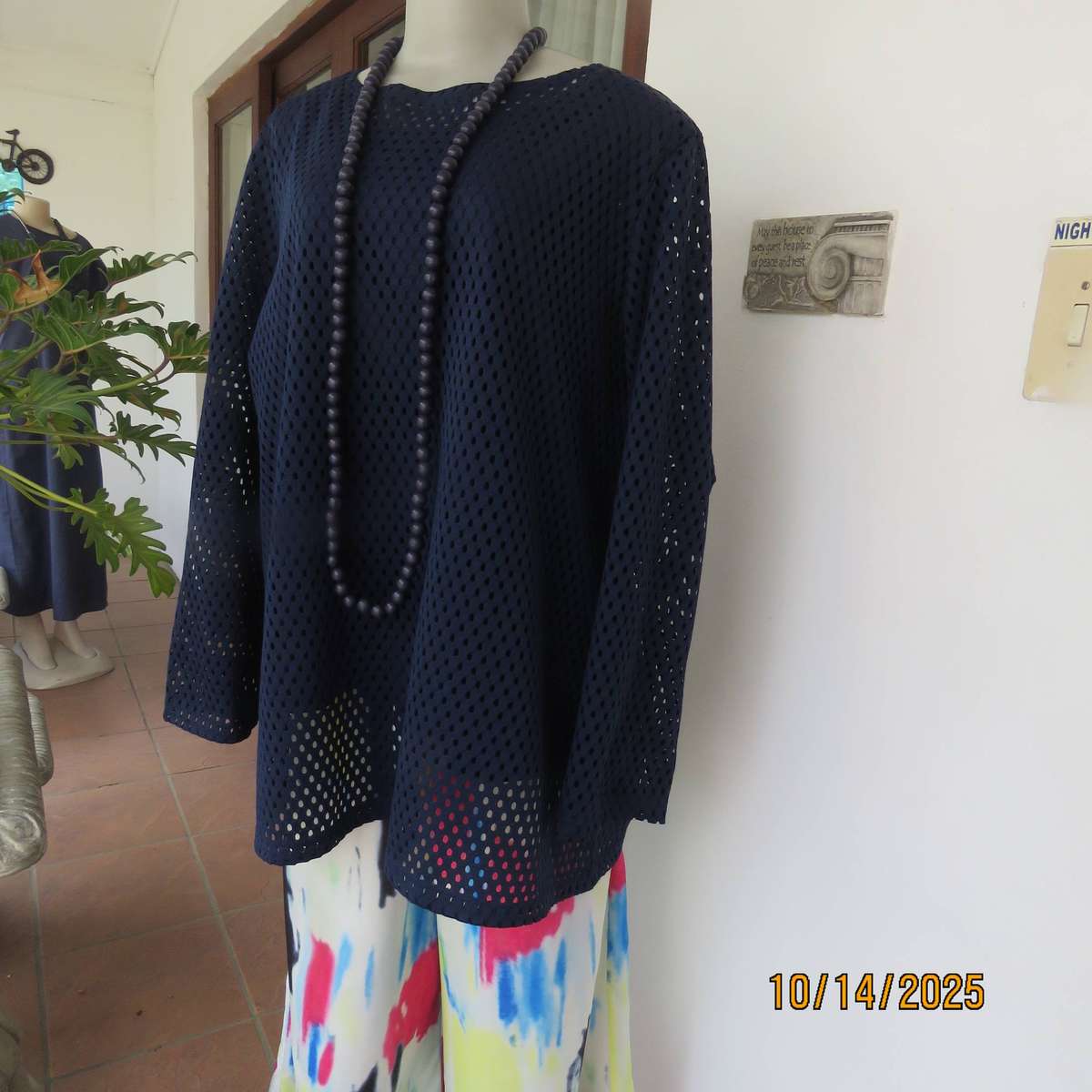 Navy polyester mesh slip over long sleeve top in size 46 to 48.