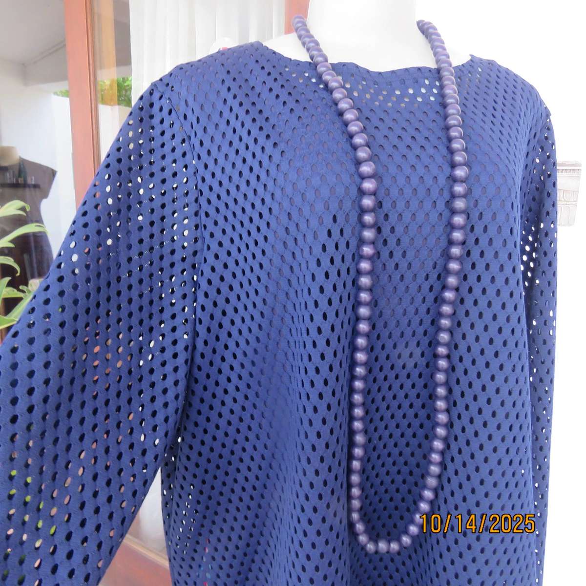 Navy polyester mesh slip over long sleeve top in size 46 to 48.