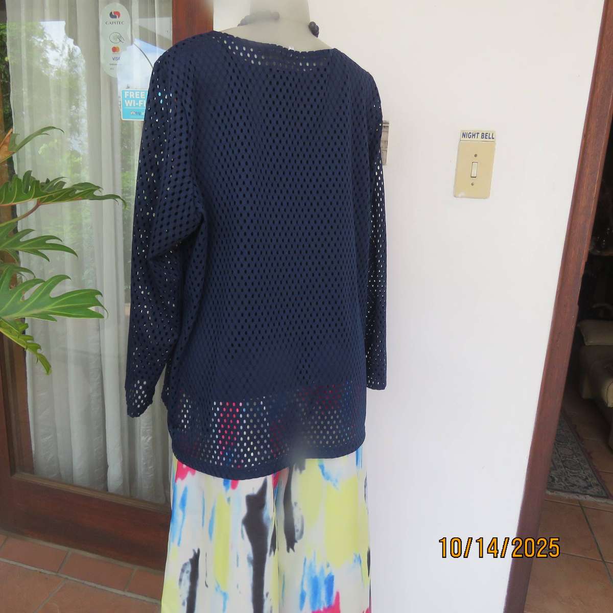 Navy polyester mesh slip over long sleeve top in size 46 to 48.