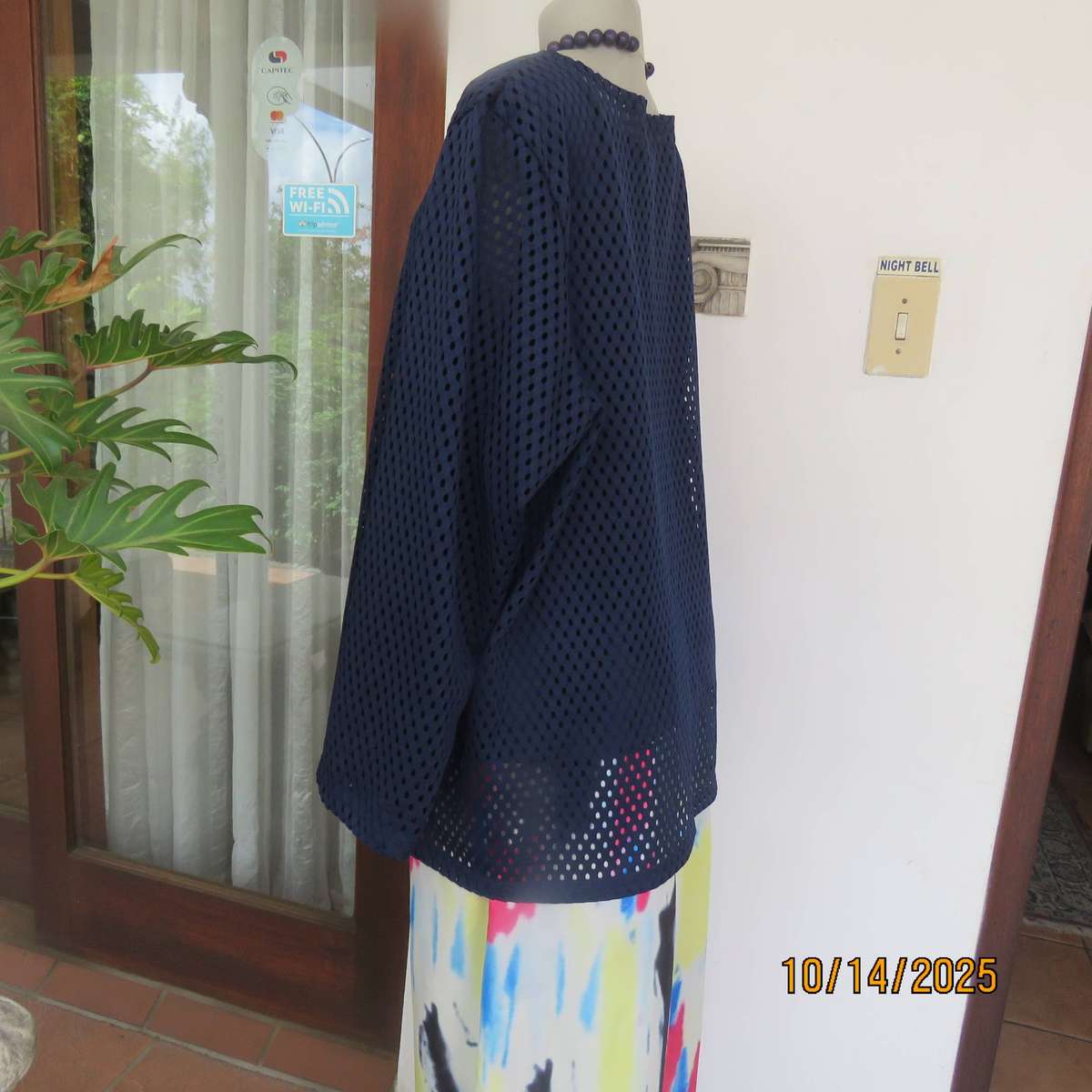 Navy polyester mesh slip over long sleeve top in size 46 to 48.