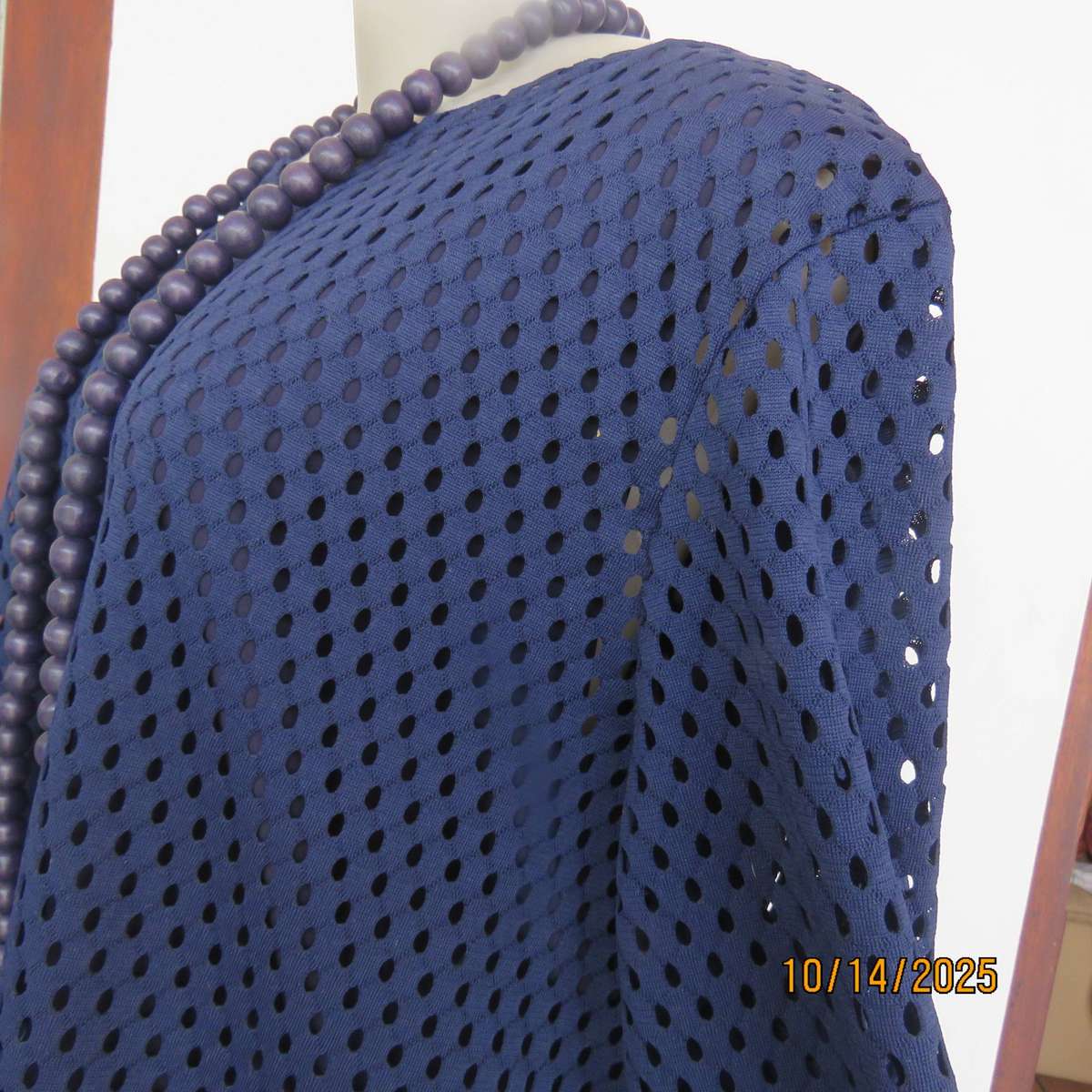 Navy polyester mesh slip over long sleeve top in size 46 to 48.