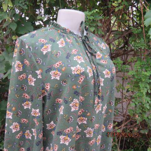 MILADYS pine green with cream-tan print slip over top. Elasticated frilled neckline. Size 40-42