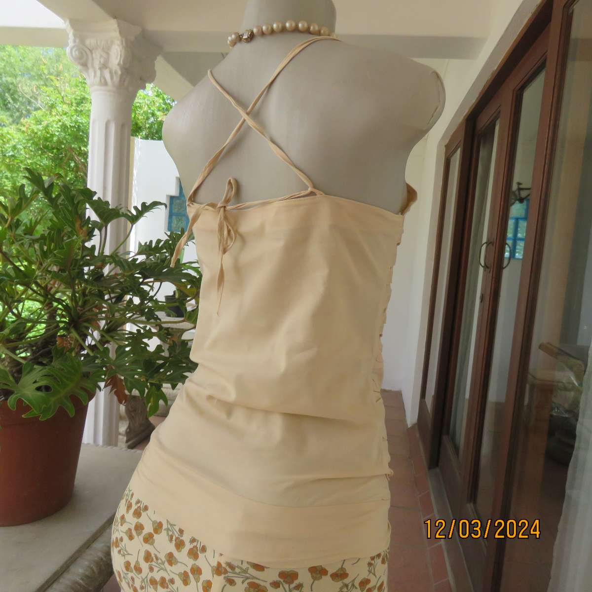 Beautiful rich cream strappy top in polycotton. Gathered front. Cross over back,Size 32.By SAMA JEE