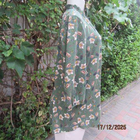 MILADYS pine green with cream-tan print slip over top. Elasticated frilled neckline. Size 40-42