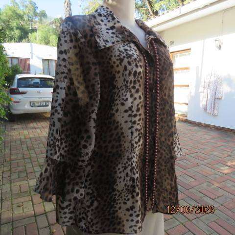 Animal print sheer polyester button-down top with open collar and elbow sleeves, size 40