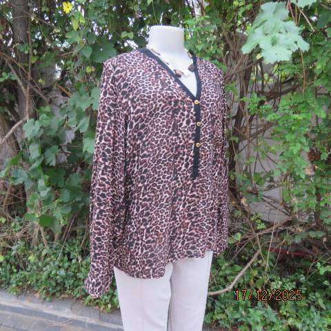 Animal print long sleeve brown-cream-black thin polycotton top. V neck with black edging. Size 44